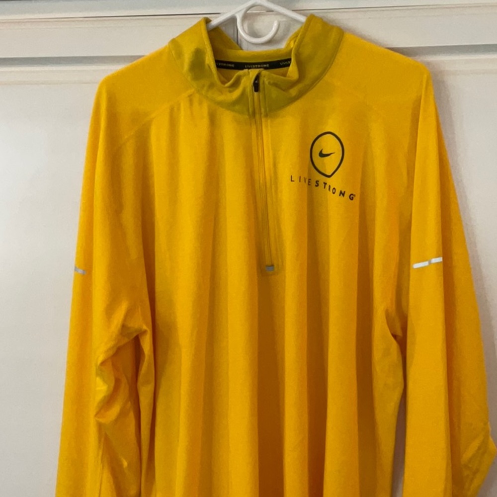Nike training top with reflective accents.